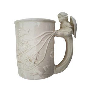 Angel Handle Mug Holding on to a Fish Net 1995